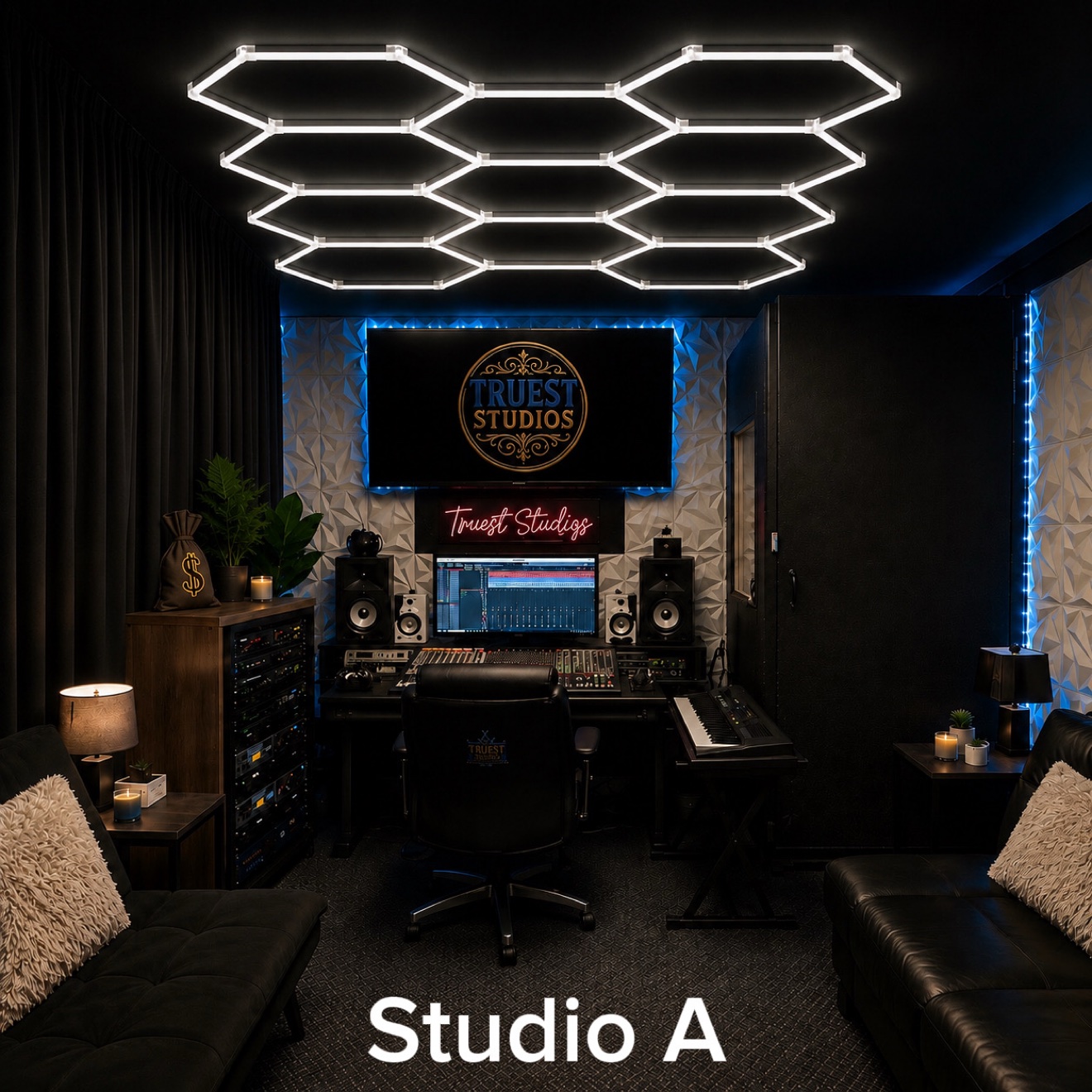 Studio A at Truest Studios — the engineer's chair in front of the mixing desk, Truest Studios screen and neon sign